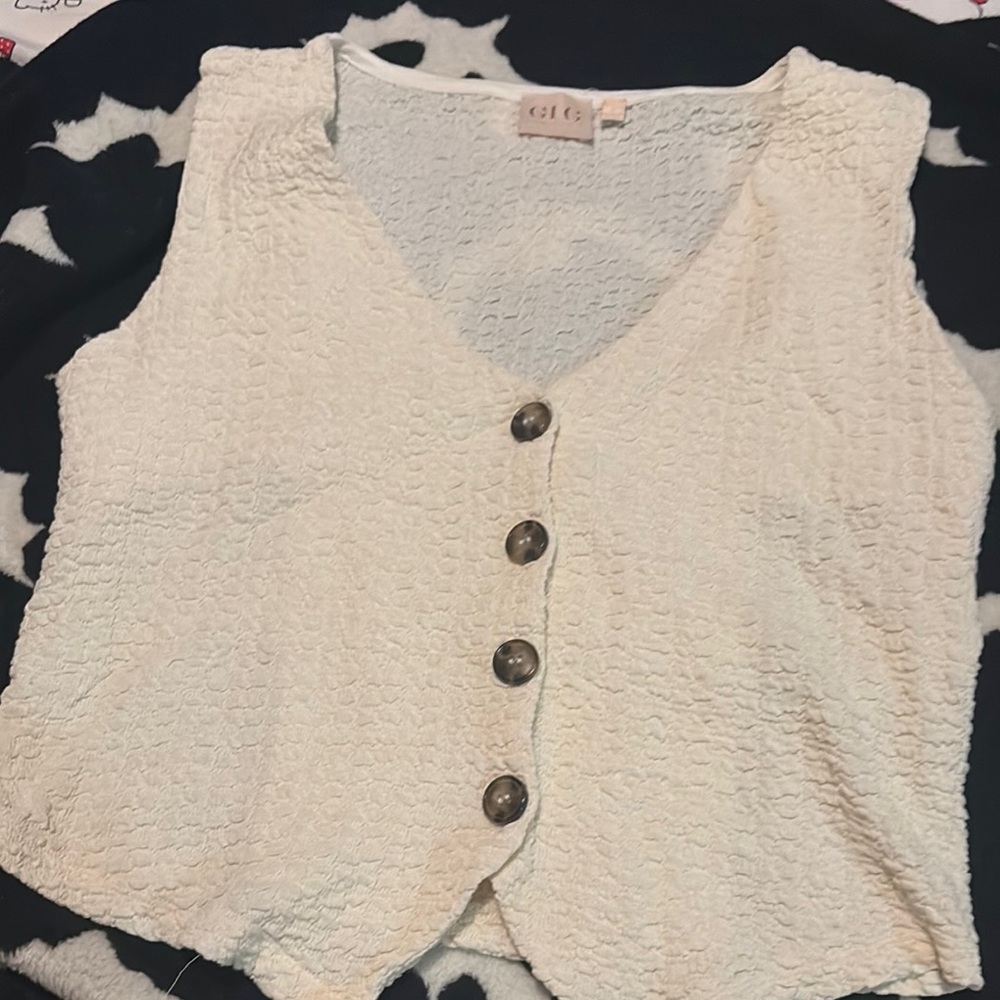 Good Luck Gem Cream Sleeveless Button Down Blouse